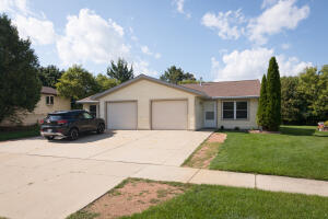 1334  Honeysuckle Rd in Hartford wi. List Price: $450,000